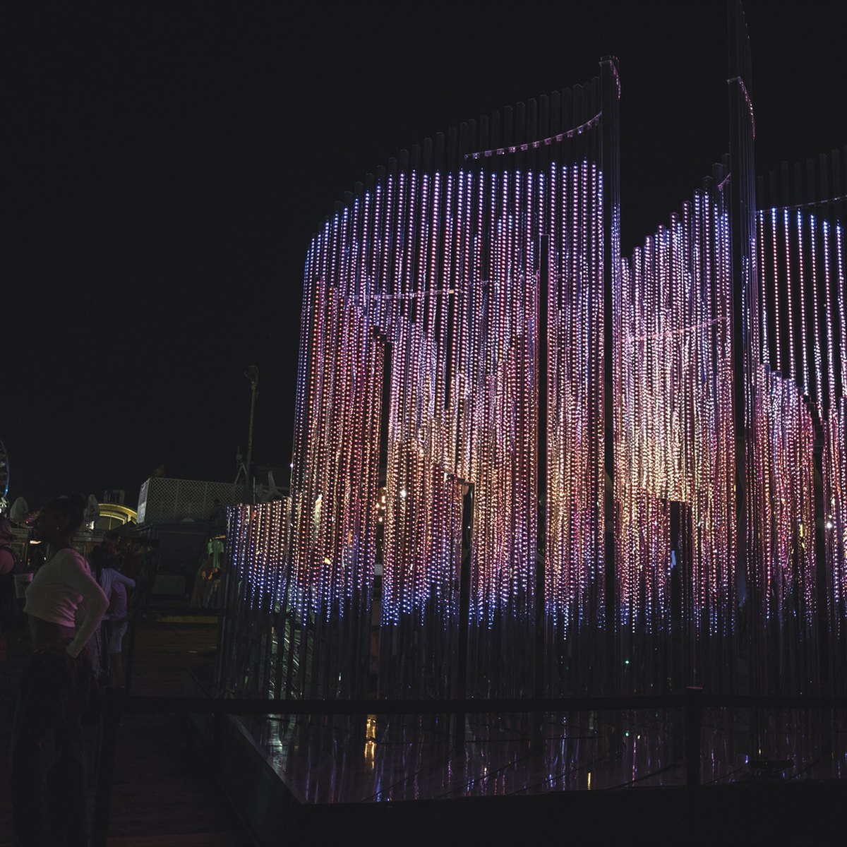 The sculpture lighting up the pier at night